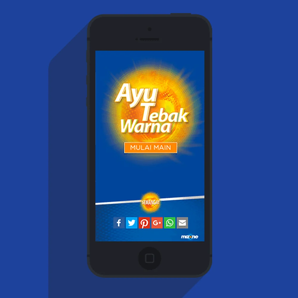 The microsite's “Ayu Tebak Warna” game screen on a phone.