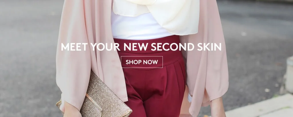 A Zolace homepage banner: “Meet your new second skin”.